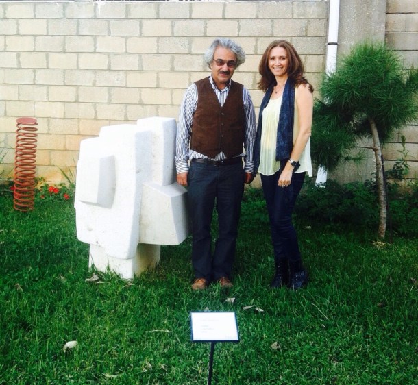 Nabil Basbous, the son of Youssef Basbous, featured sculptor in current exhibition Age of Wood, and myself next to one of his sculptures.