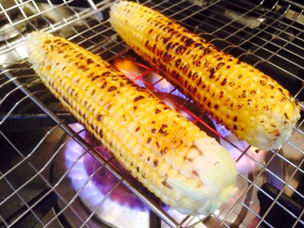 Fresh young corn, roasting on top of my gas stove